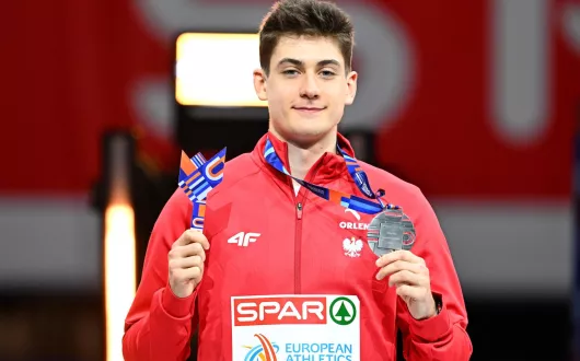 Maksymilian Szwed z medalem